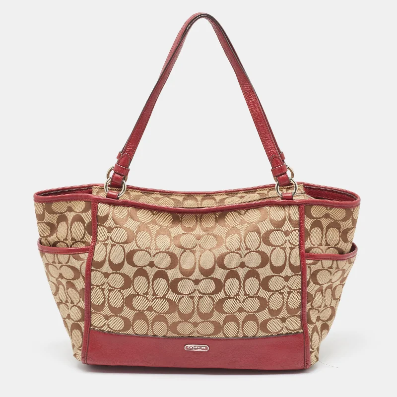 Coach crossbody bags with a detachable coin purse for added functionalityBeige/Burgundy Signature Canvas and Leather Carrie Tote