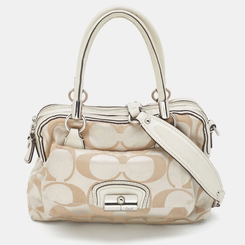 Coach Rogue bags featuring the signature C - hardware for a branded lookBeige Signature Canvas and Leather Buckle Satchel