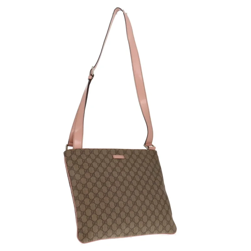 Gucci tote bags for women with a printed Gucci logoGucci GG Large Supreme Canvas Messenger With Soft Pink Leather Trims