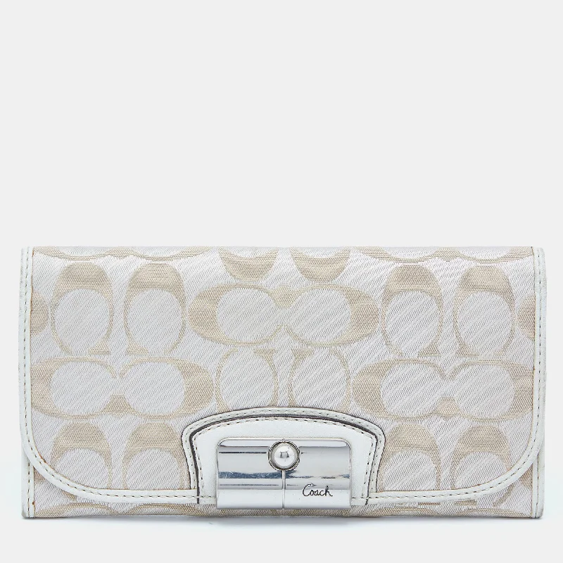 Ladies Coach Tabby bags with gold - toned hardware for a touch of luxuryBeige/White Signature Canvas and Leather Flap Continental Wallet