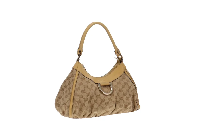 Ladies Gucci shoulder bags with a tassel decorationGucci GG Canvas and Lemon Yellow Trim Abbey D Ring Shoulder Bag