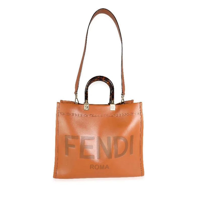 Ladies Fendi shoulder bags with a tassel - decorated zipper for added charm and styleFENDI Brown Debossed Leather & Tortoiseshell Plexiglass Medium Sunshine Shopper