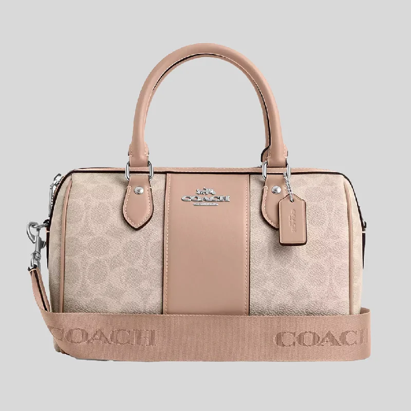 Coach handbags with a perforated leather detail for a breathable and unique designCOACH Rowan Satchel Bag In Signature Canvas Sand/Taupe CW376