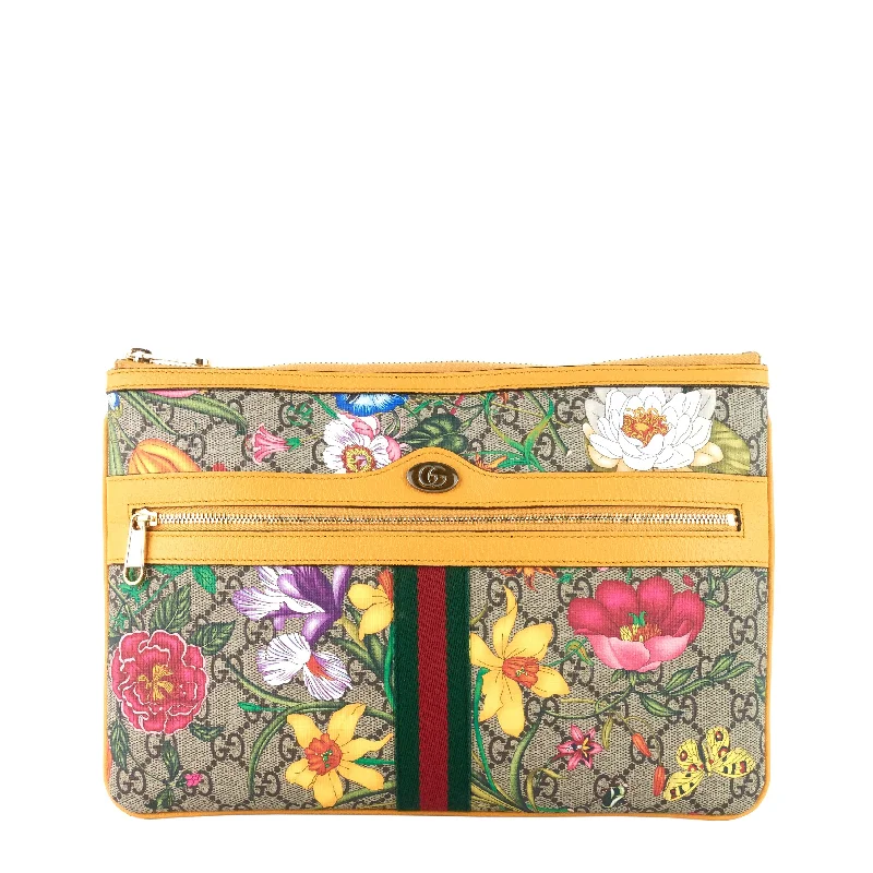 Ladies Gucci Dionysus bags in a pastel colorOphidia GG Supreme Canvas Floral Clutch Bag