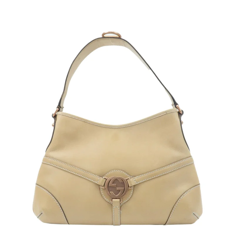 Women Gucci crossbody bags with a woven leather strapGUCCI Interlocking G Leather Shoulder Bag Beige 114877