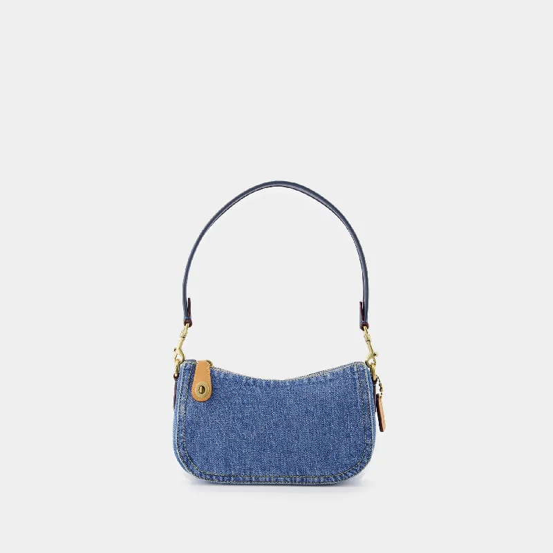 Coach bags with a zippered interior pocket for separating itemsHobo Swinger 20 bag - Coach - Cotton - Denim - Blue