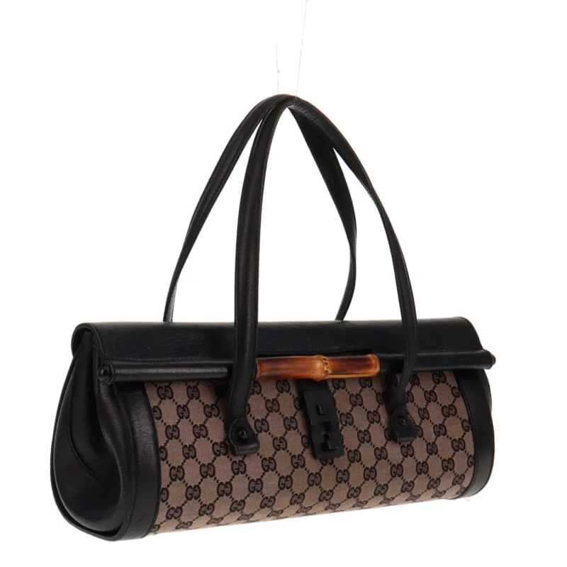 Women Gucci Sylvie bags with a monogram - embossed leatherGucci Black GG Canvas & Leather Bullet Bag