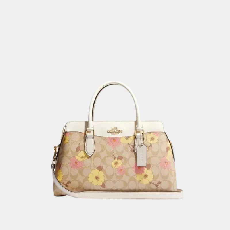 Ladies Coach Tabby bags with gold - toned hardware for a touch of luxuryCoach Darcie Carryall In Signature Canvas With Floral Cluster Print BOUTIQUE