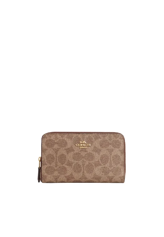 Ladies Coach Borough bags in a pastel shade for a soft and delicate appearanceCoach Medium ID Zip Wallet Signature Canvas In Tan Brown CW781