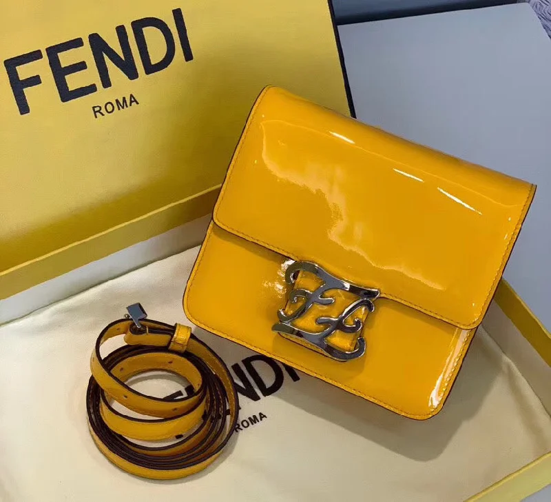 Fendi bags with a chain - link trim and a leather body for a modern and edgy lookFendi Karligraphy Bag In Yellow Patent Leather