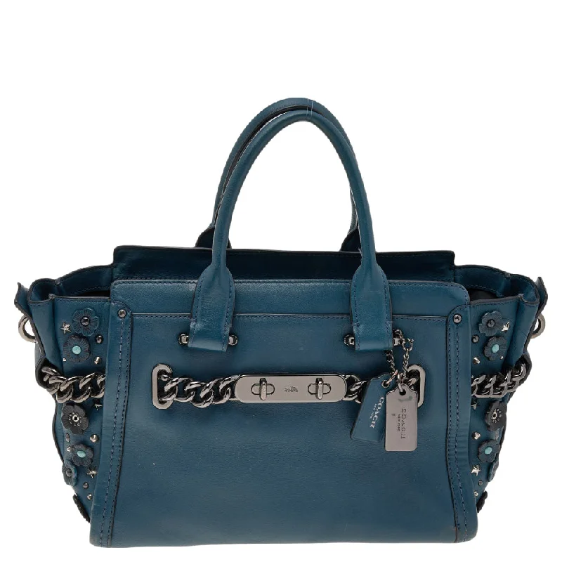 Coach tote bags with a spacious interior and multiple compartments for organizationBlue Patch Embellished Leather Swagger 27 Carryall Satchel