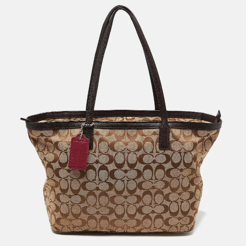 Coach tote bags with a double - handle and shoulder - strap option for easy useBeige/Brown Signature Canvas and Leather Shopper Tote