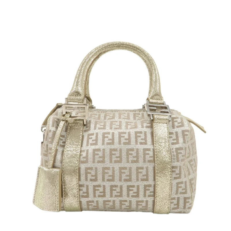 Fendi By The Way bags with a printed map pattern for a travel - inspired lookFENDI Zucchino Canvas Leather Mini Boston Bag Gold 8BL071