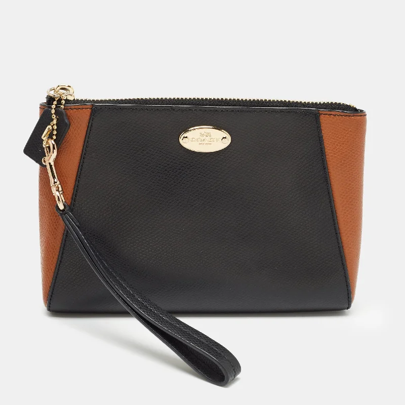 Coach Borough bags with a contrast - stitched handle for a unique lookBlack/Brown Leather Morgan Wristlet Clutch