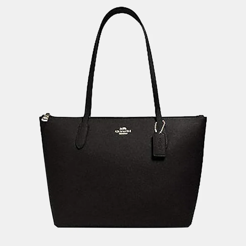 Coach Dempsey bags with a crystal - embellished C - logo for added luxuryBlack Crossgrain Leather Handbag