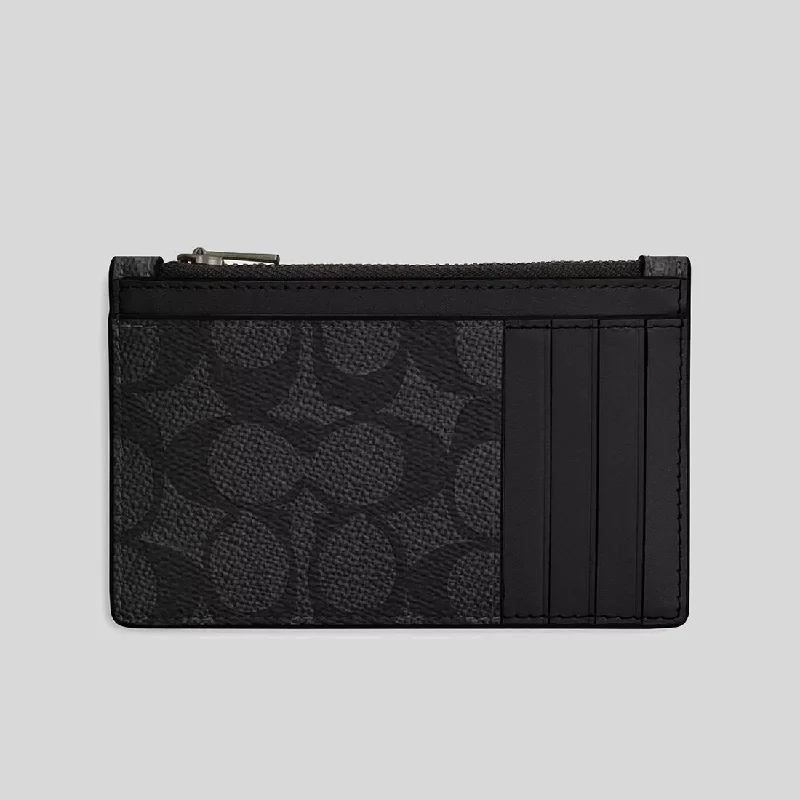 Coach handbags with a beaded trim for a glamorous and elegant lookCOACH Zip Card Case In Signature Canvas Charcoal/Black CV764