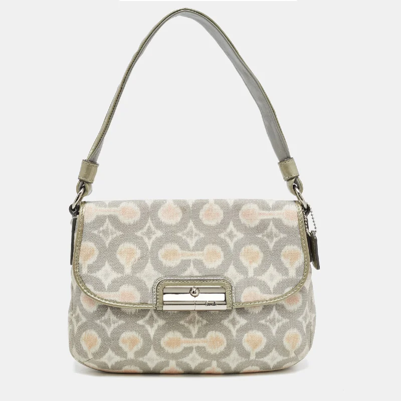 Coach Dempsey bags with a contrast - colored interior for visual interestGrey/Multicolor Signature Canvas Op Art Kristin Shoulder Bag