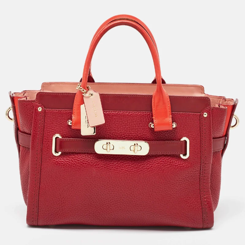 Ladies Coach Borough bags in a pastel shade for a soft and delicate appearanceTwo Tone Red Leather Swagger 27 Carryall Tote