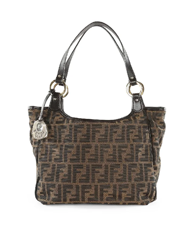 Ladies Fendi Peekaboo bags with a detachable shoulder strap for different carrying optionsFENDI Brown FF Zucca Canvas & Leather Chef Tote Bag