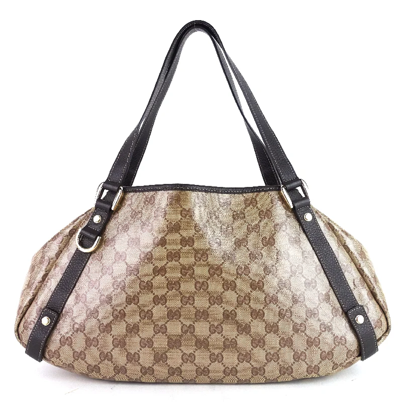 Women Gucci bags with interlocking G hardware for a classic lookPelham Crystal GG Canvas Bag