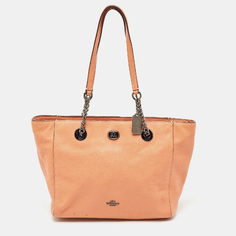 Coach bags with a chain - link trim and a leather body for a modern edgePeach Leather Turnlock Chain Tote