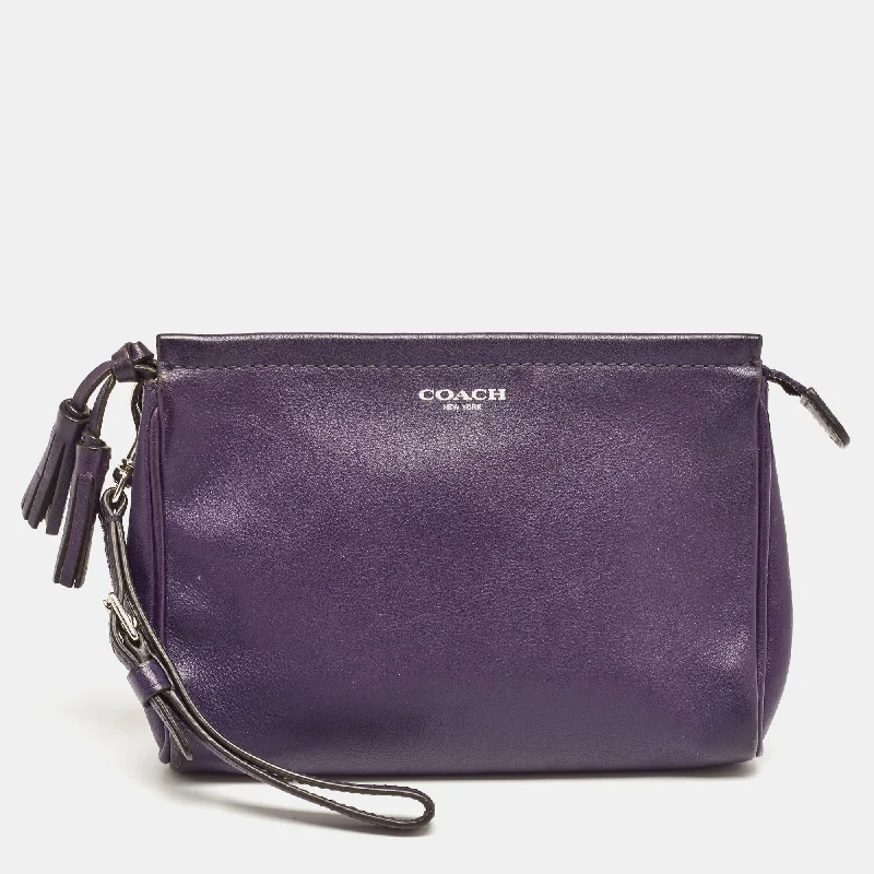 Coach Rogue bags featuring the signature C - hardware for a branded lookPurple Leather Wristlet Clutch