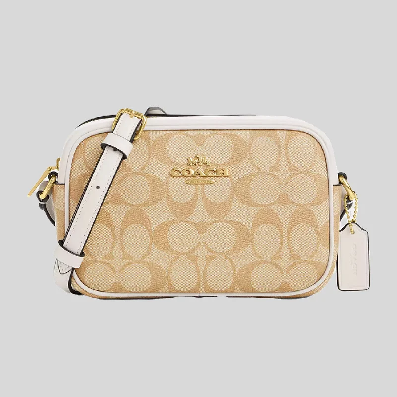 Coach bags with a back - zip pocket for storing valuables securelyCOACH Mini Jamie Camera Bag In Signature Canvas Light Khaki/Chalk CQ874