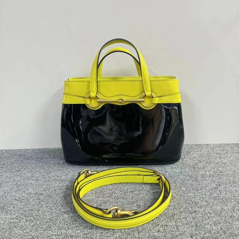 Women Gucci bags with a magnetic snap closure for easy accessGucci Black And Yellow Patent Leather Two Way Bag Medium Size