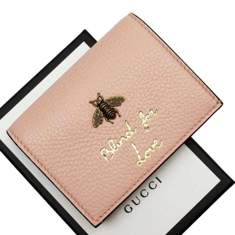 Gucci Marmont bags for women with quilted leather exteriorsGucci bi-fold wallet pink leather 460185