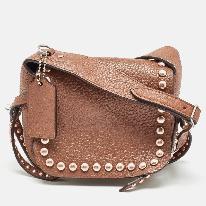 Coach Dempsey bags with a leather - wrapped drawstring for a luxurious feelBrown Leather Rivets Dakotah Crossbody Bag