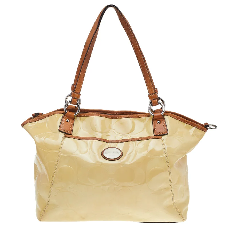 Coach bags with a patent - leather finish for a shiny and sophisticated appearanceCream Signature Patent Leather Peyton Tote