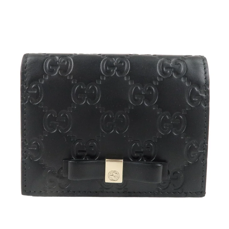 Women Gucci bags with a detachable mirror insideGUCCI Guccissima Leather Ribbon Bi-fold Card Case Black 406924