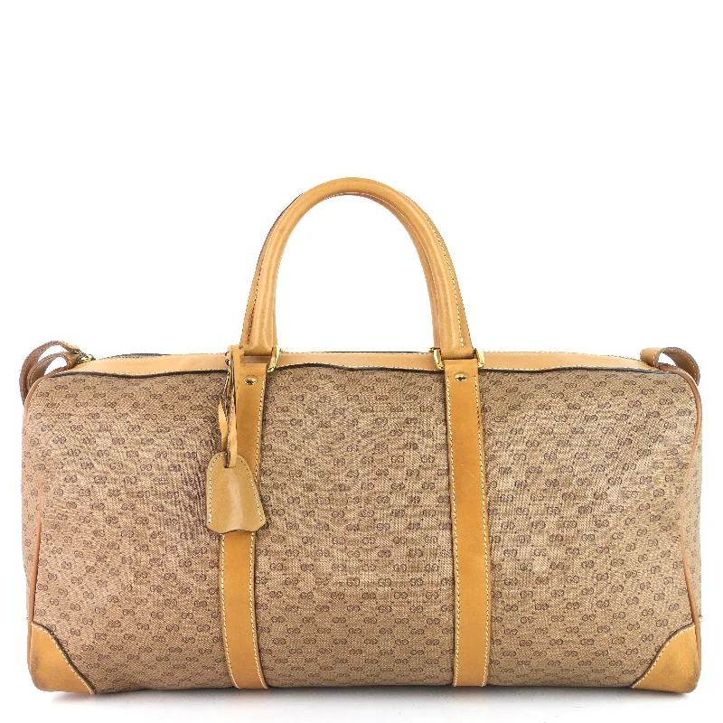 Gucci handbags for women with a patent - leather finishGG Coated Canvas Travel Bag