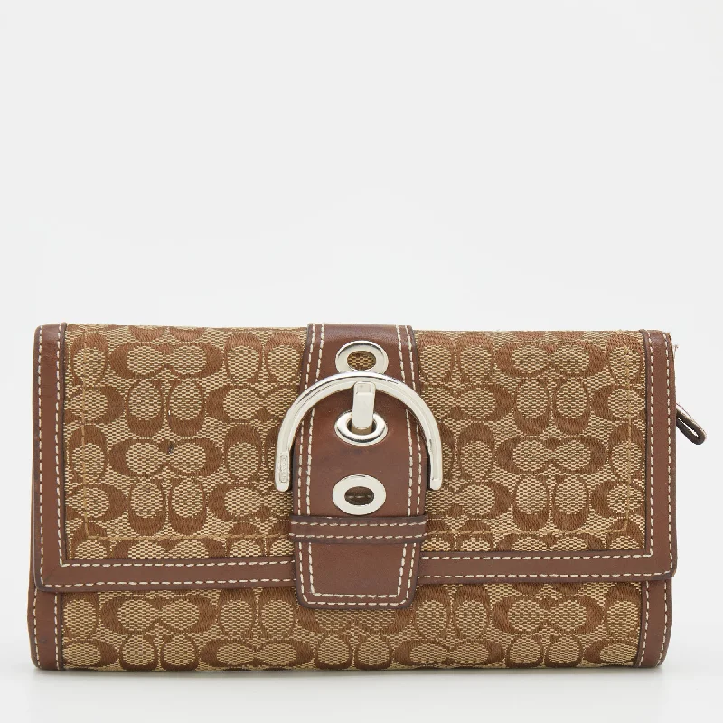 Coach Borough bags with a contrast - stitched handle for a unique lookBeige/Brown Signature Canvas and Leather Buckle Detail Continental Wallet