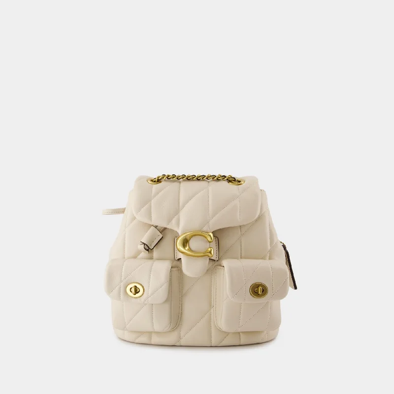 Ladies Coach Tabby bags with gold - toned hardware for a touch of luxuryTabby Backpack - Coach - Leather - Beige