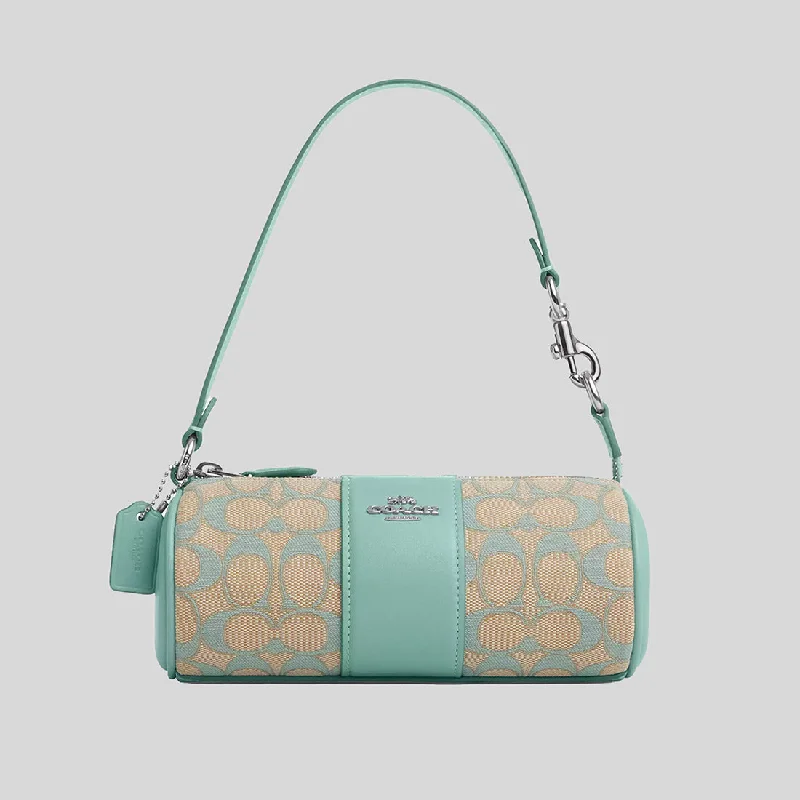 Coach Borough bags with a removable interior organizerCOACH Nolita Barrel Bag In Signature Jacquard Faded Blue CU003