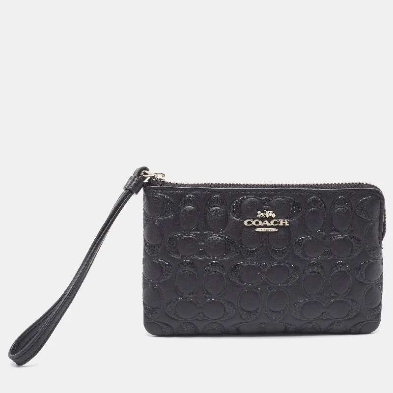 Coach handbags with a metal - framed clasp for durability and styleBlack Signature Glitter Embossed Leather Boxed Wristlet Clutch