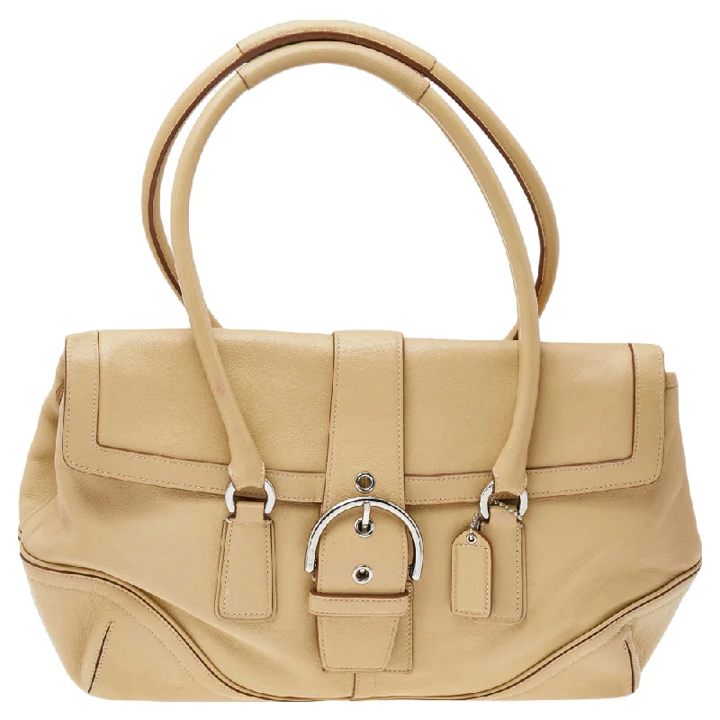 Ladies Coach Tabby bags with a detachable shoulder strapCream Soho Hamptons Buckle Leather Satchel