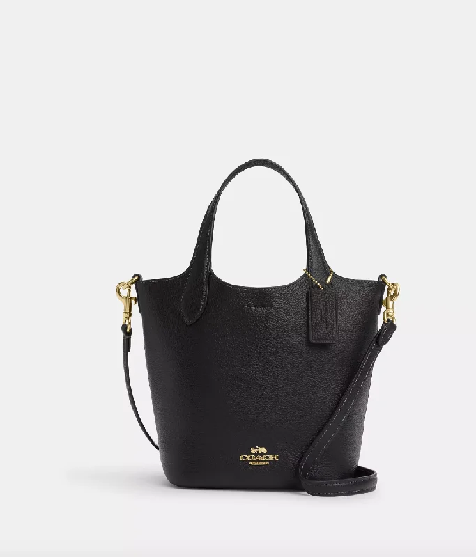 Coach bags with a chain - link trim and a leather body for a modern edgeCoach Hanna Bucket Bag In Black