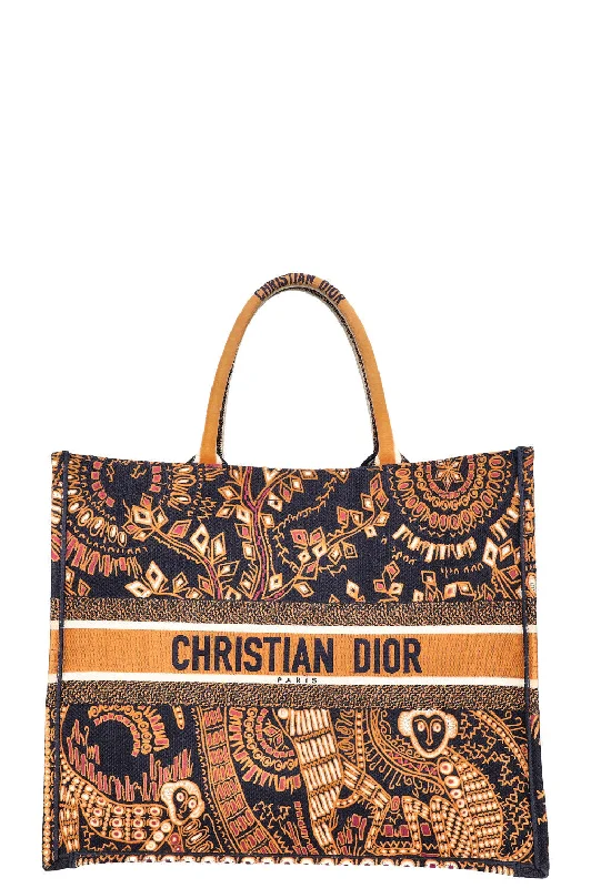 Christian Dior handbags with a snap - button closure and a decorative buckleCHRISTIAN DIOR Animal Book Tote Large Monkey