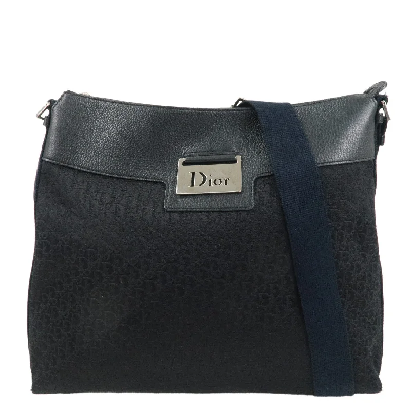 Christian Dior handbags with a snap - button closure and a decorative buckleChristian Dior Trotter Canvas Leather Shoulder Bag Black